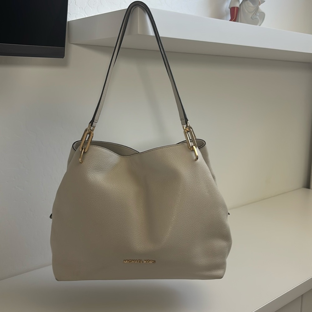 New condition Michael Kors handbag. Cream color